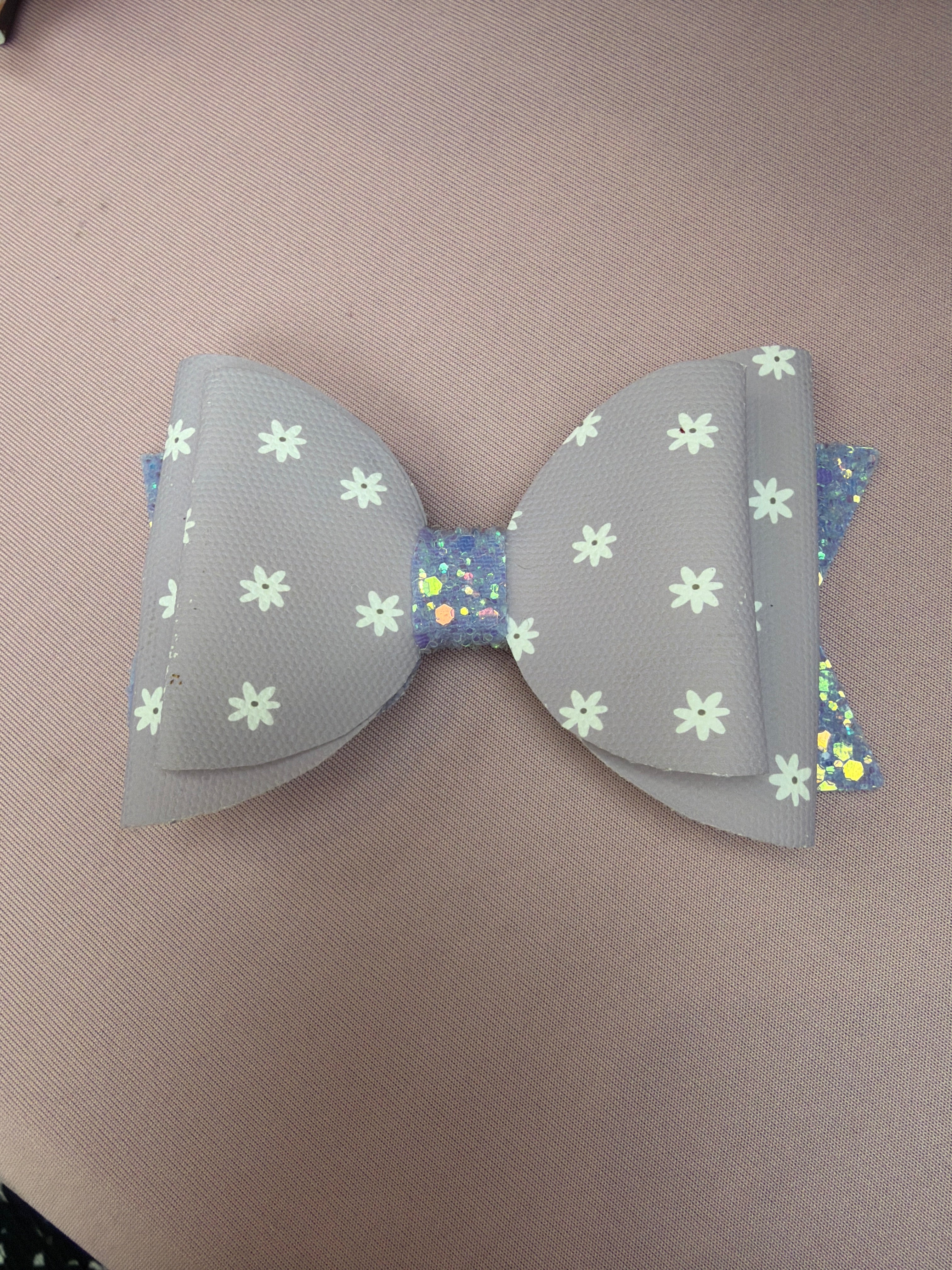 Purple floral bow